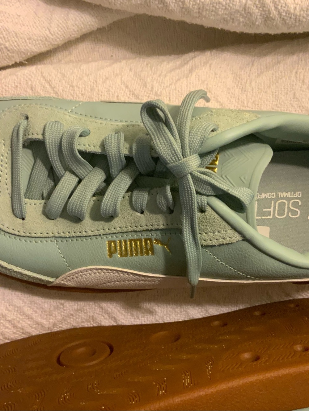 Puma Baby Blue Women's Sneakers with Gold Logo